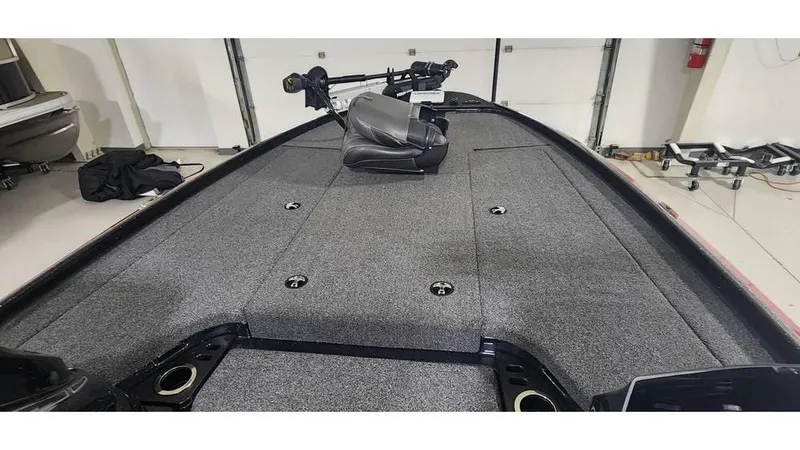 Slide: The Image of 2019 Nitro Z20 boat interior with gray carpet and seating. - 7