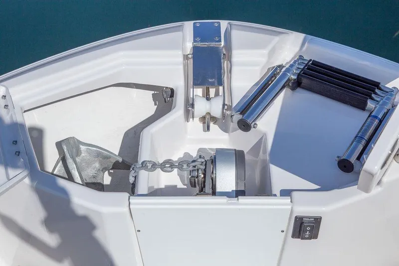 Slide: The Image of Bow of 2026 Solara S-250 DC boat with anchor and chain mechanism. - 2
