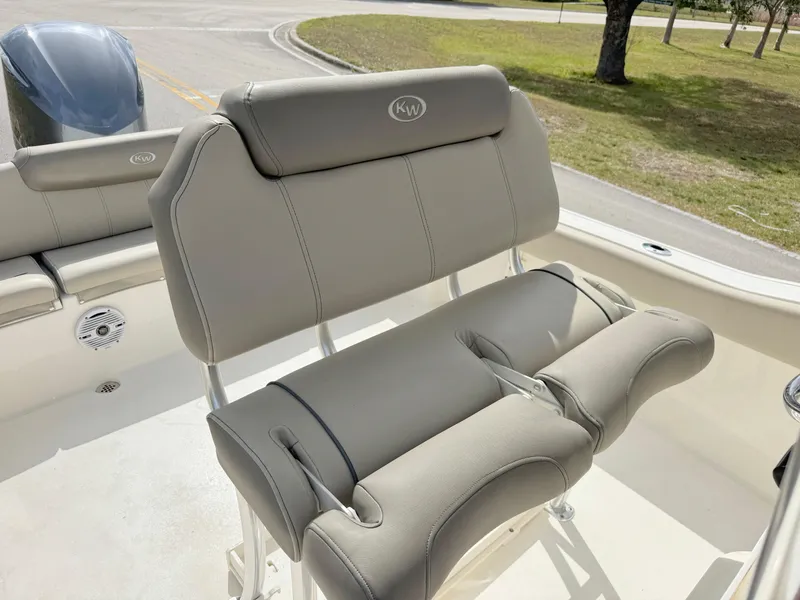 Slide: The Image of 2023 Key West 239 FS boat with comfortable seating and sleek design. - 15