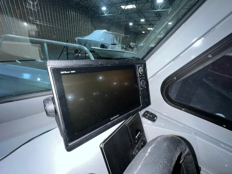 Slide: The Image of 2022 Hewescraft 210 Sea Runner ET HT dashboard with Garmin GPS display. - 21