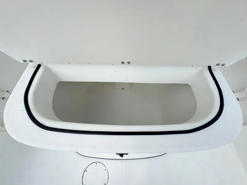 Slide: The Image of Storage compartment on 2016 Clearwater 2200 WI Center Console boat. - 26