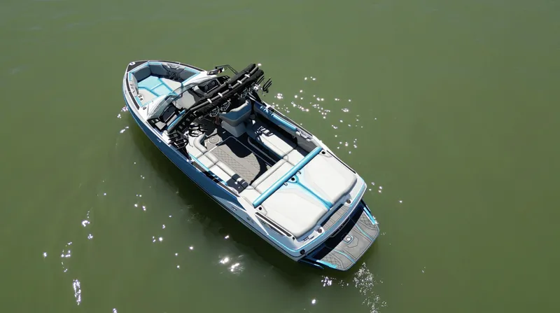 Slide: The Image of 2018 Axis T23 boat on calm green water, aerial view. - 35