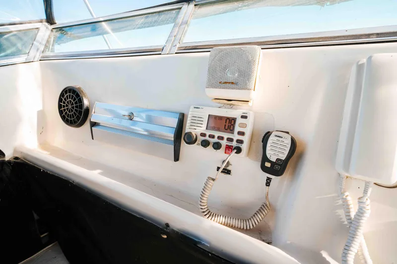 Slide: The Image of 1989 Sumerset houseboat control panel with radio and speaker system. - 33