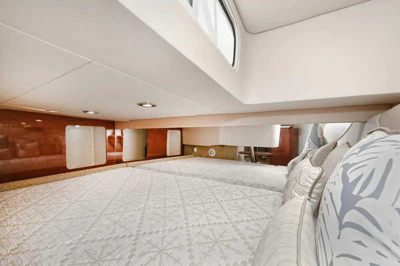 Slide: The Image of Interior cabin of 2010 Formula 350 SS boat with cozy bedding and modern design. - 12
