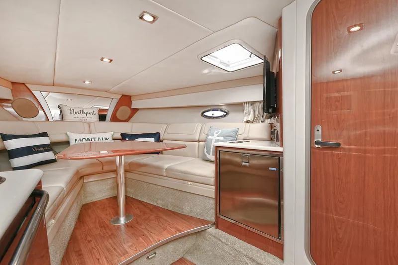 Slide: The Image of Luxurious interior of 2010 Formula 350 SS boat with cozy seating and modern amenities. - 13