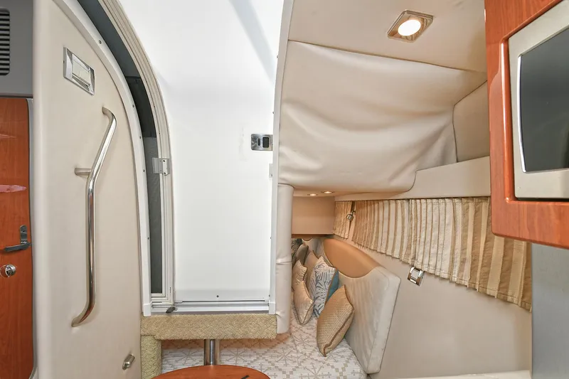 Slide: The Image of Interior cabin of 2010 Formula 350 SS boat with cozy seating and modern amenities. - 14