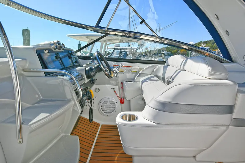 Slide: The Image of 2010 Formula 350 SS boat interior with sleek dashboard and comfortable seating. - 18