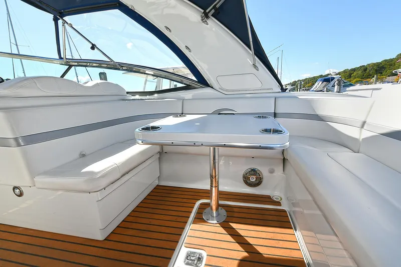 Slide: The Image of Luxurious 2010 Formula 350 SS boat interior with sleek seating and elegant table. - 26