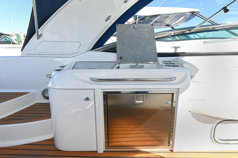 Slide: The Image of 2010 Formula 350 SS yacht with outdoor kitchenette and stainless steel appliances. - 31