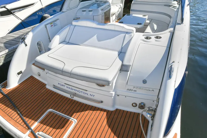 Slide: The Image of 2010 Formula 350 SS boat with white seating and teak deck, docked in Port Washington, NY. - 36