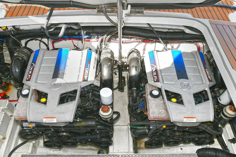Slide: The Image of Twin engines in a 2010 Formula 350 SS boat, showcasing powerful marine performance. - 42