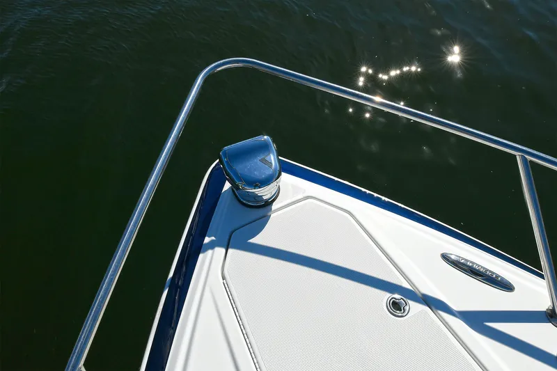 Slide: The Image of Bow of a 2010 Formula 350 SS boat with stainless steel railing on water. - 47
