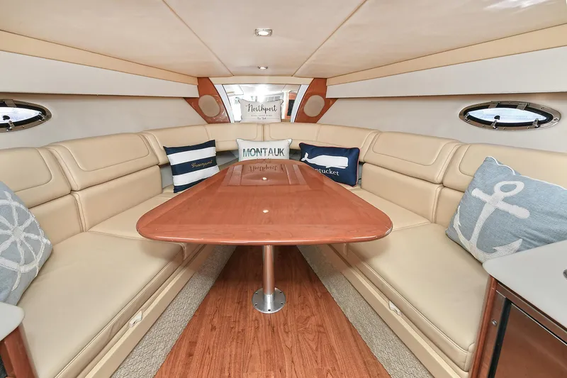 Slide: The Image of Luxurious interior of 2010 Formula 350 SS boat with elegant seating and nautical decor. - 8
