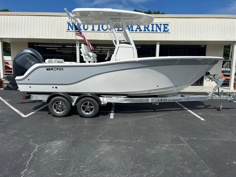 The Image of 2025 Sea Fox 228 Commander boat on trailer at Nautical Marine dealership. - 0