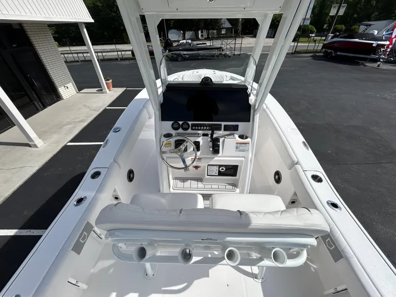 Slide: The Image of 2025 Sea Fox 228 Commander boat interior with helm and seating. - 7