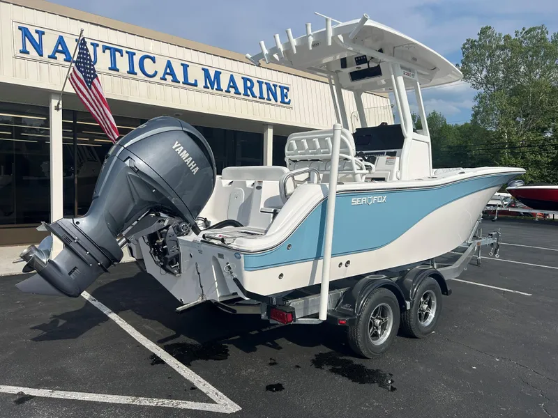 Slide: The Image of 2024 Sea Fox 228 Commander boat with Yamaha engine at Nautical Marine dealership. - 6