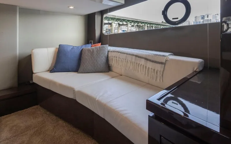 Slide: The Image of Luxurious interior of 2019 Carver C52 Command Bridge yacht with plush seating and modern design. - 29