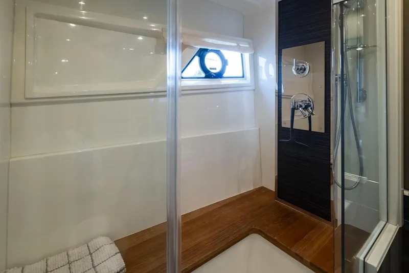 Slide: The Image of Modern bathroom interior on 2019 Carver C52 Command Bridge yacht. - 32