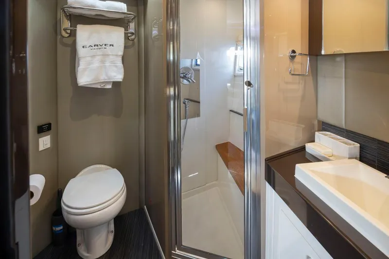 Slide: The Image of Luxurious bathroom in 2019 Carver C52 Command Bridge yacht with modern amenities. - 36
