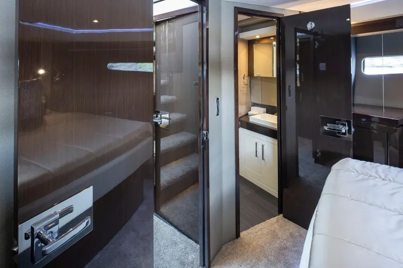 Slide: The Image of Luxurious interior of 2019 Carver C52 Command Bridge yacht, featuring modern design and elegant finishes. - 37