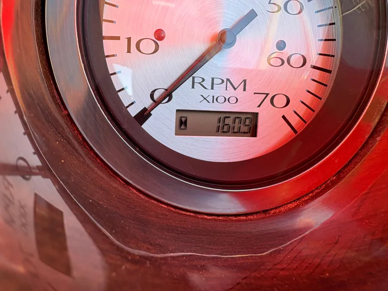 Slide: The Image of Close-up of a 2015 Bennington 21 SLX SPS RPM gauge displaying 1609 RPM. - 15