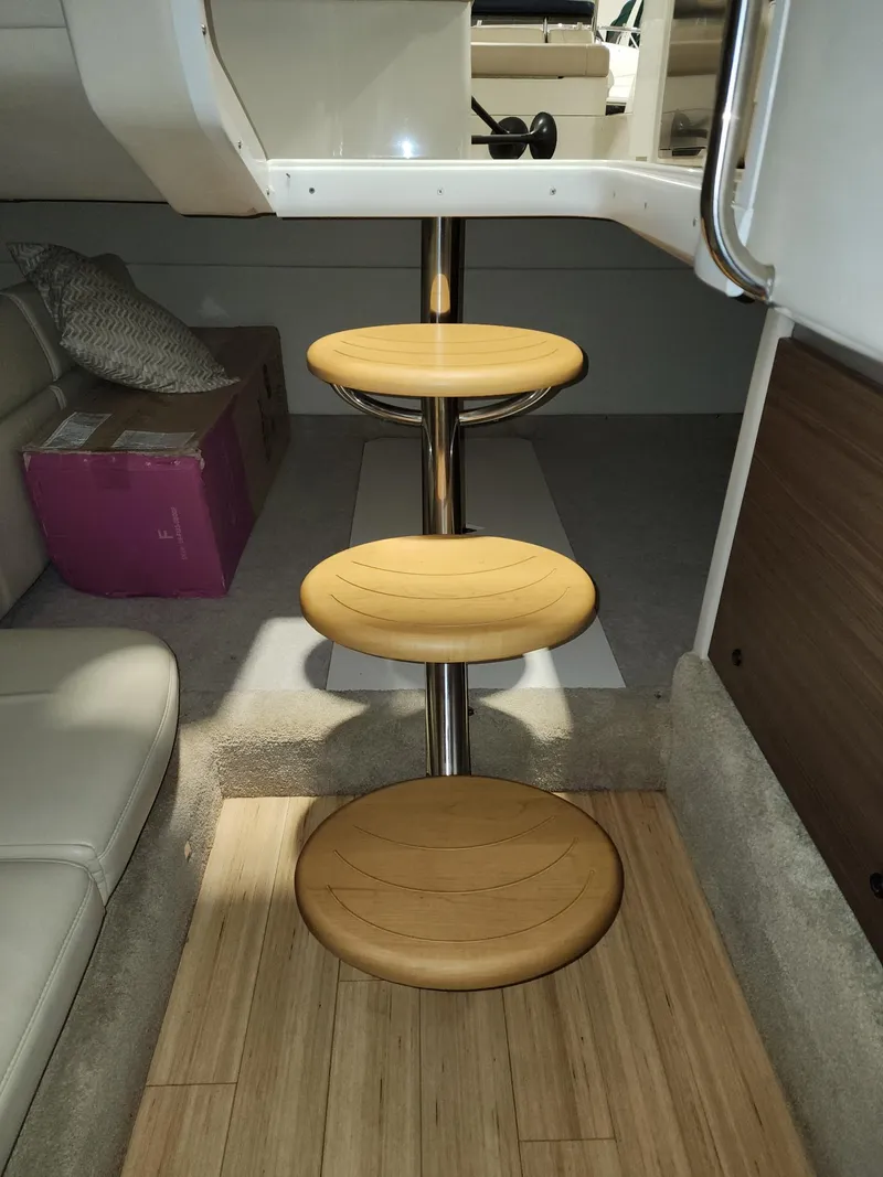 Slide: The Image of 2018 Formula 350 CBR interior with wooden steps and modern seating. - 13