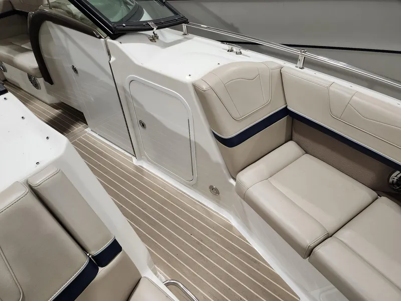 Slide: The Image of 2018 Formula 350 CBR boat interior with beige seating and striped flooring. - 21