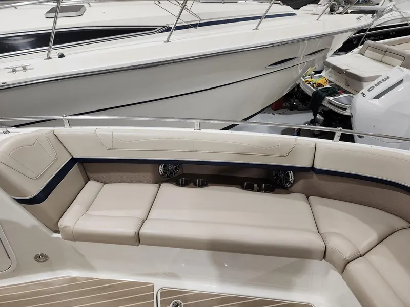 Slide: The Image of 2018 Formula 350 CBR boat interior with beige seating and sleek design. - 9