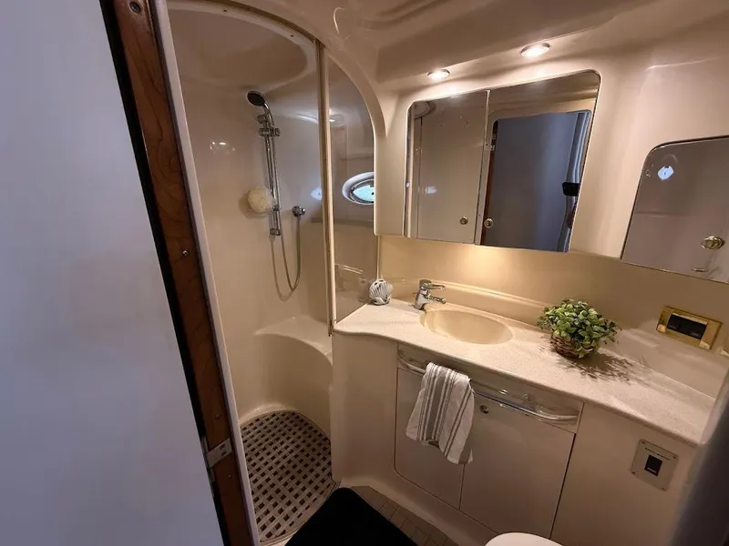 Slide: The Image of Luxurious bathroom in 2000 Sea Ray 510 Sundancer yacht with shower and vanity. - 31