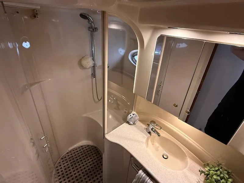 Slide: The Image of Luxurious bathroom in 2000 Sea Ray 510 Sundancer yacht with shower and vanity. - 33