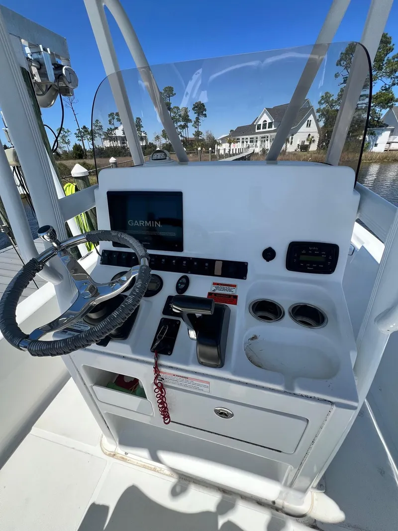 Slide: The Image of Center console of a 2015 Sea Hunt BX 22 BR boat with Garmin navigation. - 7