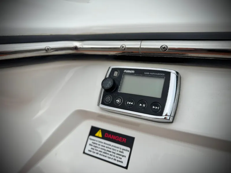 Slide: The Image of Control panel on a 2015 MasterCraft XStar boat with a Fusion audio system. - 10