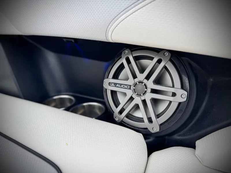 Slide: The Image of Speaker system in 2015 MasterCraft XStar boat interior with JL Audio branding. - 25