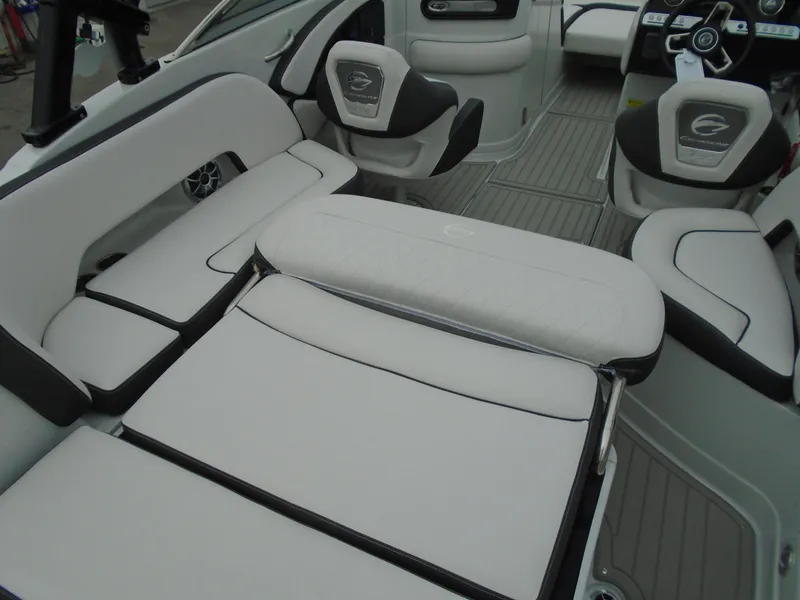 Slide: The Image of 2024 Crownline E 240 XS boat interior with luxurious seating and modern design. - 10