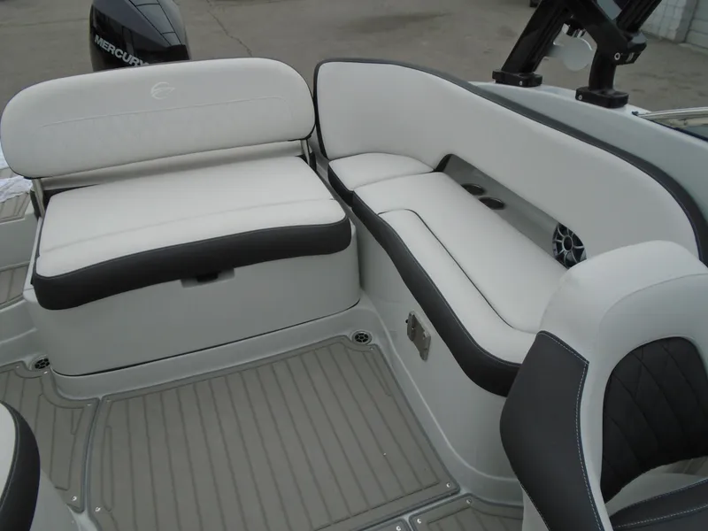 Slide: The Image of 2024 Crownline E 240 XS boat interior with white and black seating. - 8