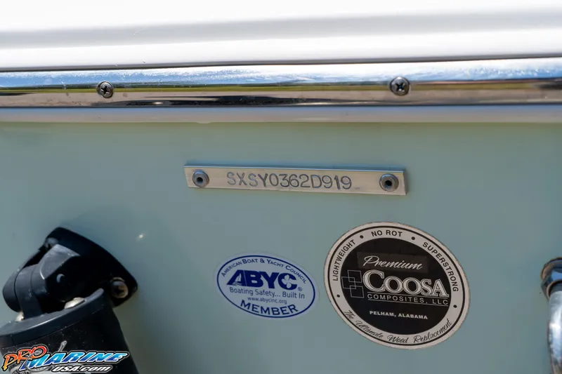 Slide: The Image of 2019 Sea Hunt Ultra 234 boat with ABYC and Coosa Composites certification labels. - 30