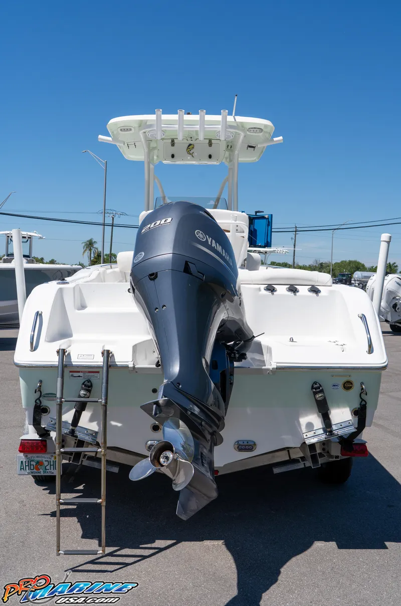 Slide: The Image of 2019 Sea Hunt Ultra 234 boat with Yamaha outboard motor, rear view. - 8