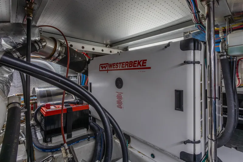 Slide: The Image of Engine room of 2003 Selene 47 yacht with Westerbeke generator and battery. - 28