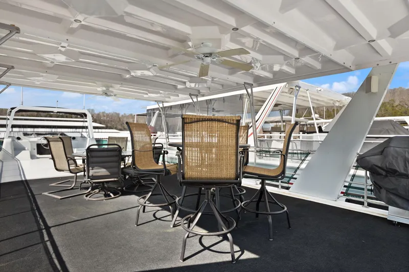 Slide: The Image of Spacious deck of 1998 Sharpe 16 X 80 Widebody Houseboat with outdoor seating. - 21