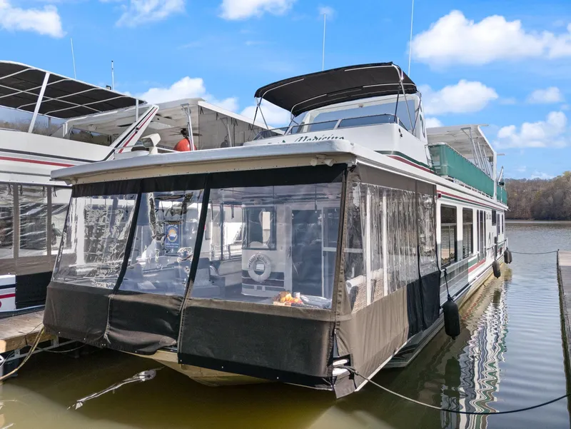 Slide: The Image of 1998 Sharpe 16 X 80 Widebody Houseboat docked on a sunny day. - 3