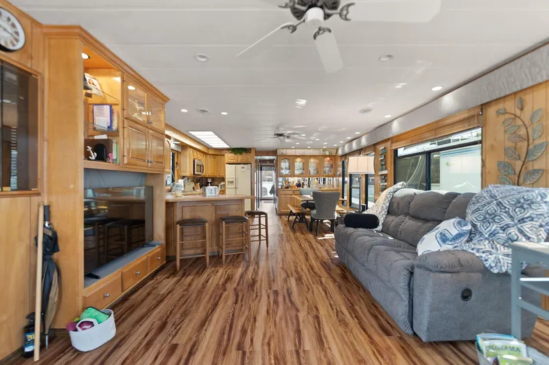 Slide: The Image of Interior of a 1998 Sharpe 16 X 80 Widebody houseboat with modern furnishings. - 30
