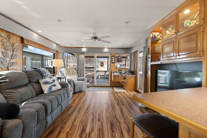 Slide: The Image of Spacious interior of 1998 Sharpe 16 X 80 Widebody Houseboat with modern furnishings. - 33