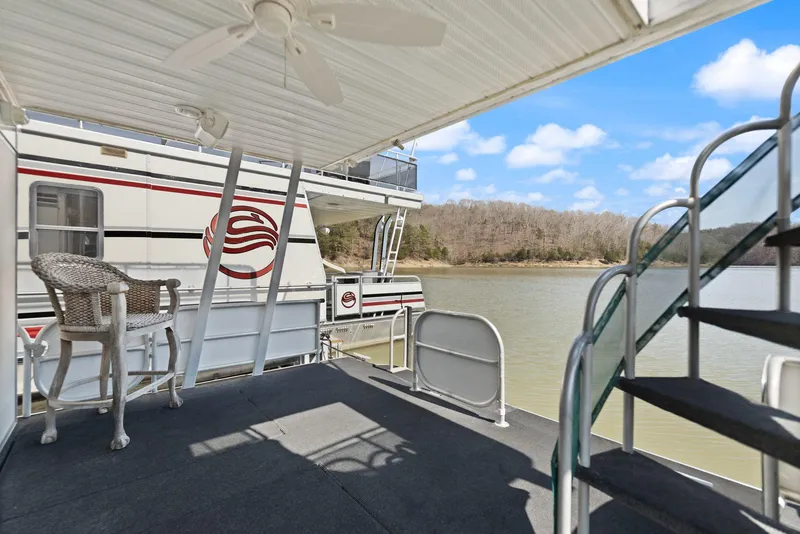 Slide: The Image of 1998 Sharpe 16 X 80 Widebody Houseboat deck with scenic lake view. - 57