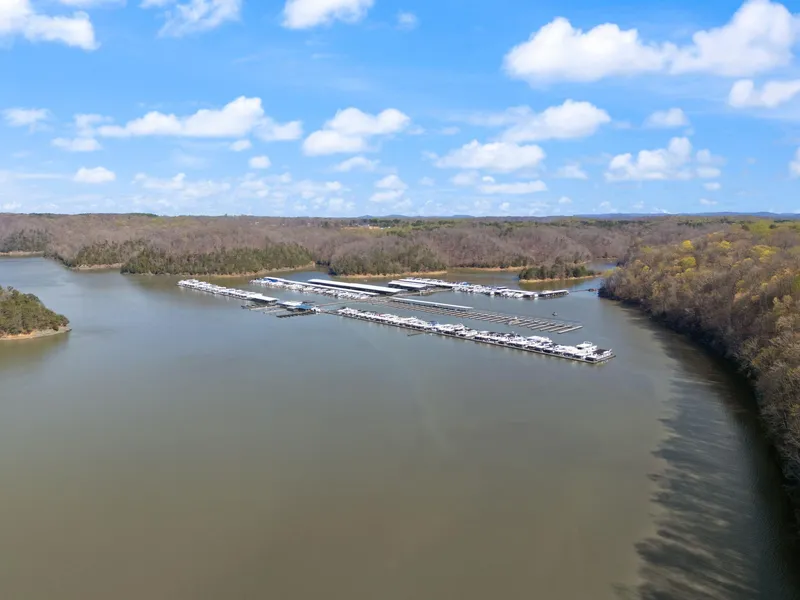 Slide: The Image of Aerial view of marina with 1998 Sharpe 16 X 80 Widebody Houseboat docked. - 69