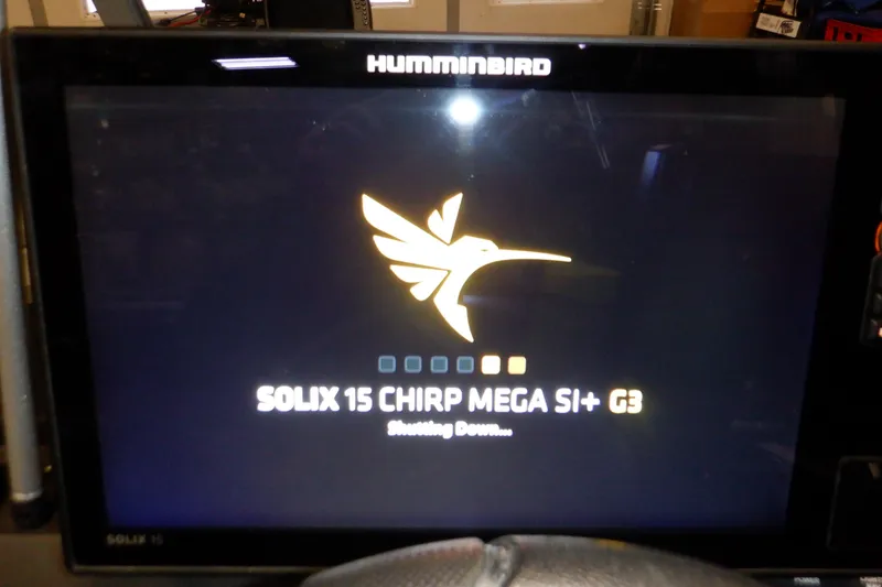 Slide: The Image of Humminbird Solix 15 CHIRP MEGA SI+ G3 fish finder shutting down on Crestliner 1950 Super Hawk. - 15
