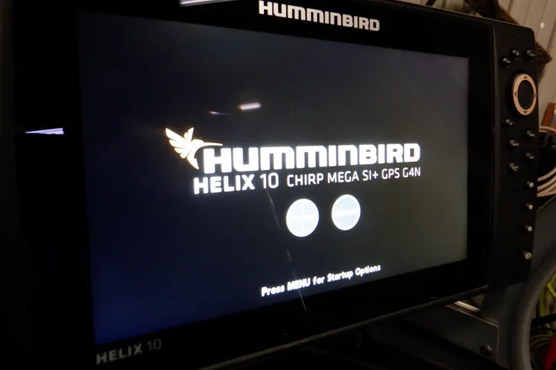 Slide: The Image of Humminbird Helix 10 fish finder display on Crestliner 1950 Super Hawk 2022 boat. - 16