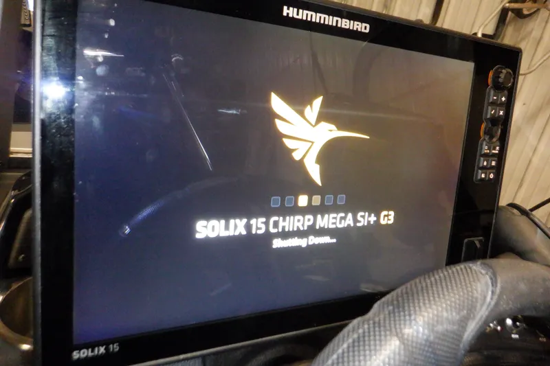 Slide: The Image of Humminbird Solix 15 fish finder on 2022 Crestliner 1950 Super Hawk boat. - 18