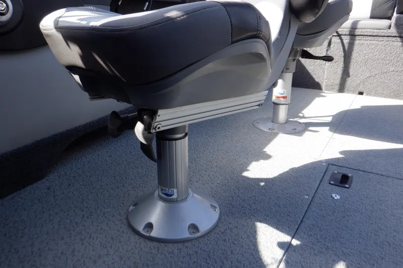 Slide: The Image of 2022 Crestliner 1950 Super Hawk boat seat and pedestal on textured floor. - 35