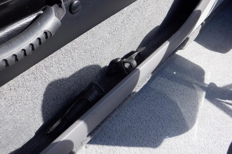 Slide: The Image of 2022 Crestliner 1950 Super Hawk interior detail with carpeted flooring and storage compartment. - 39