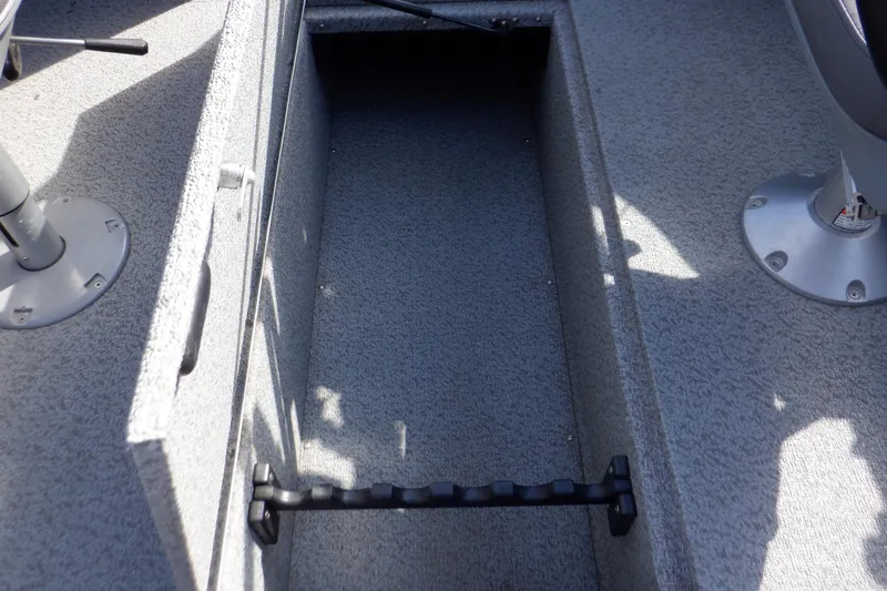 Slide: The Image of 2022 Crestliner 1950 Super Hawk interior storage compartment with rod holders. - 41